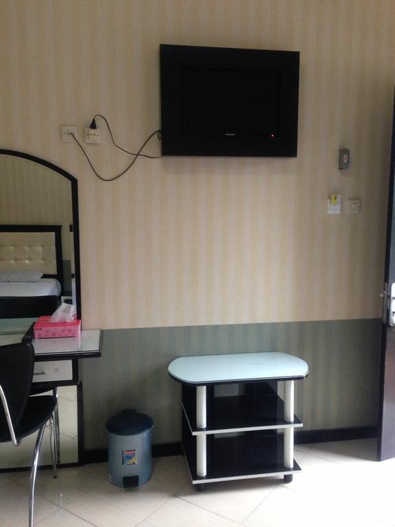 Global Inn Keluarga Sedati Номер фото