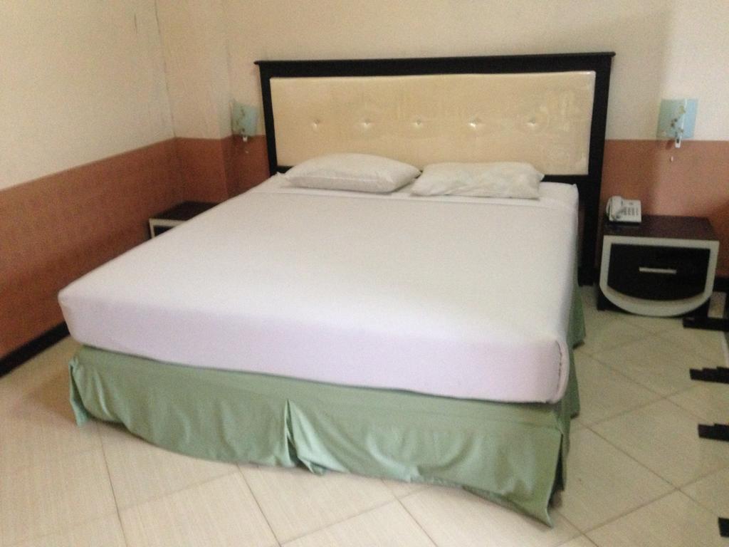 Global Inn Keluarga Sedati Номер фото