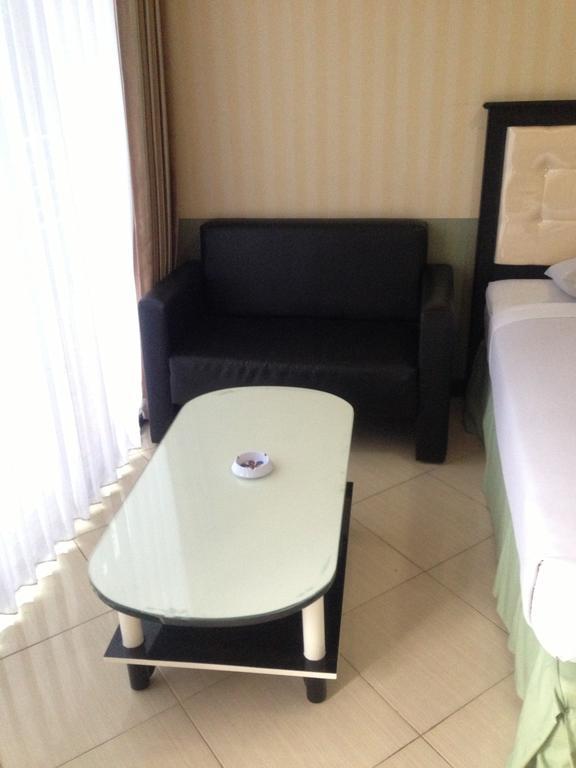 Global Inn Keluarga Sedati Номер фото